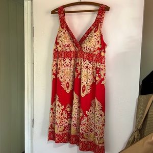Super cute red and gold with sparkles dress.